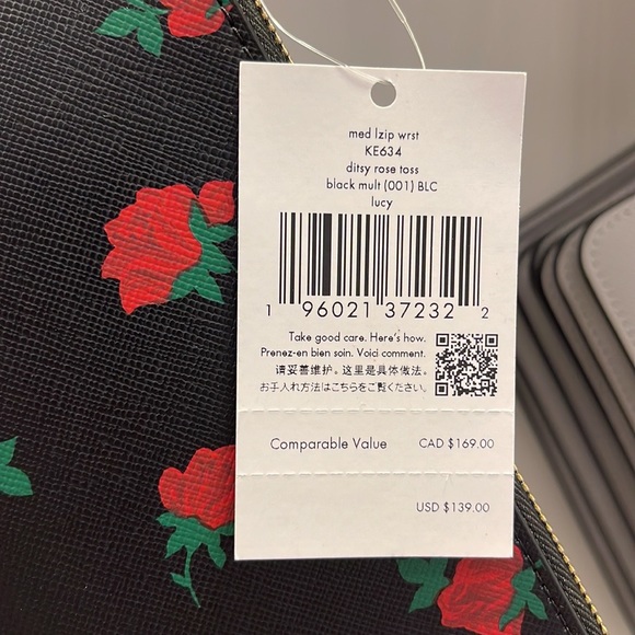 Kate Spade Lucy Medium L-Zip Wristlet
COLOR:
Black Multi
NWT - Picture 6 of 16